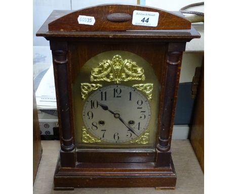 Oak cased mantel clock.