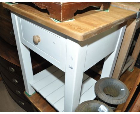 A polished and painted pine kitchen island, with frieze drawer and shelf below, width 72cm, height 89cm, depth 60cm.