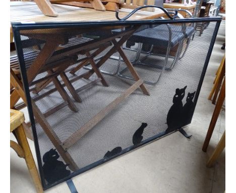 A black mesh cat design firescreen, length 107cm.