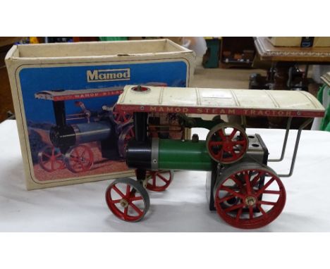 A boxed Mamod traction engine.