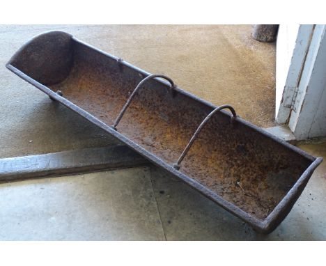 A 19th Century cast iron 3 division pig trough