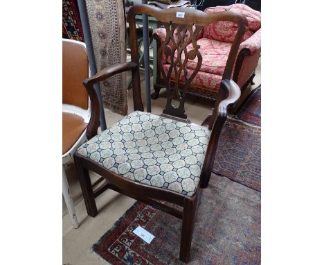 A Georgian mahogany desk chair in Chippendale style.