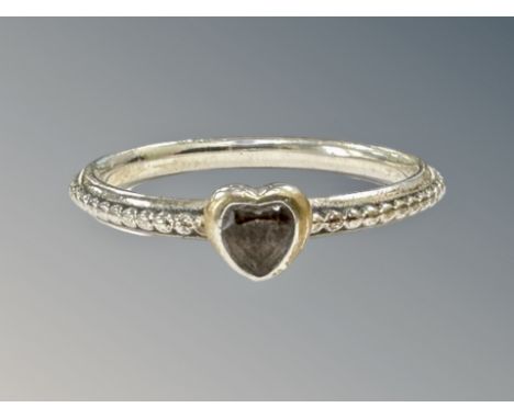 A Pandora silver ring with heart shaped stone, stamped S925 ALE 54, size M