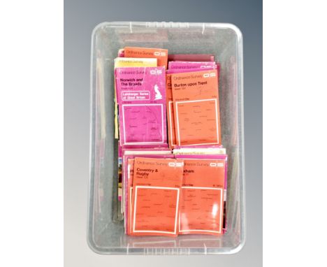 A crate of folded Ordnance Survey maps 