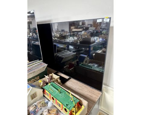 A Samsung model UE55BU8500K 55 inch LCD TV with lead and remote 