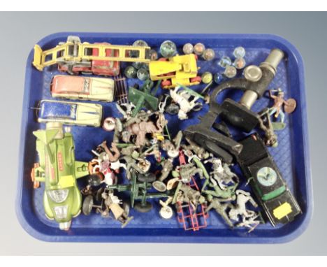 A tray of die cast vehicles : Dinky UFO Interceptor, clock work model cars, marbles, Brittons figures, Corgi Green Hornet car
