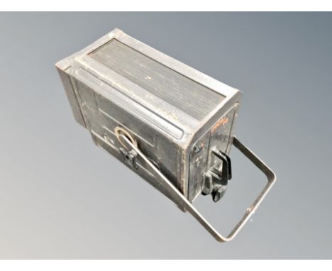A vintage metal cased French theatre light 