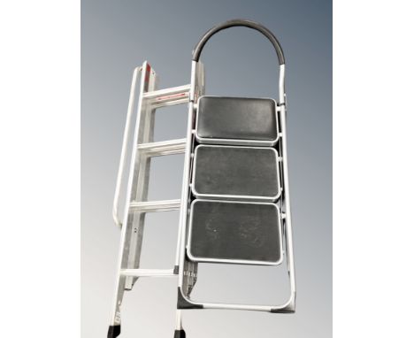 A triple section loft ladder and a set of folding steps 