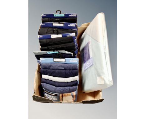 A box of five packs of M & S boxers, trunks and slips underwear, together with Tesco single duvet set, all parts as new.