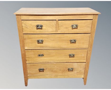 An Art Nouveau five drawer chest  