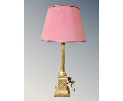 A gilt composite Corinthian column table lamp with shade, base 54 cm