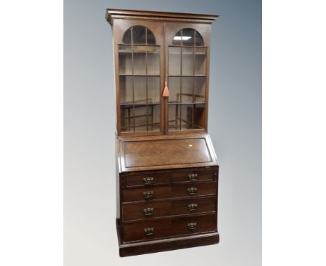 An oak Art Nouveau bureau bookcase 