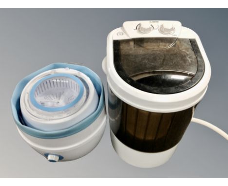 A Clarsterin bench top spinner together with an Aux mini table top washing machine 