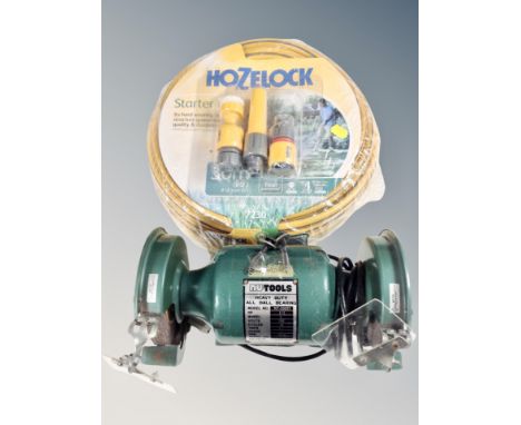 A Hozelock 30m hose with accessories (new), together with a Nutools heavy duty bench grinder 
