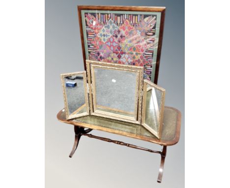 A gilt framed triptych dressing table mirror together with a fire screen and refectory coffee table 