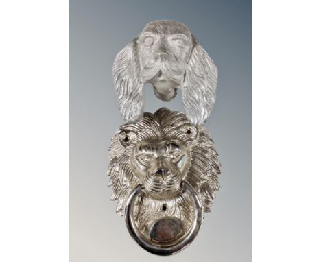 A cast metal door knocker as a spaniel's head, together with another cast as a lion's head 