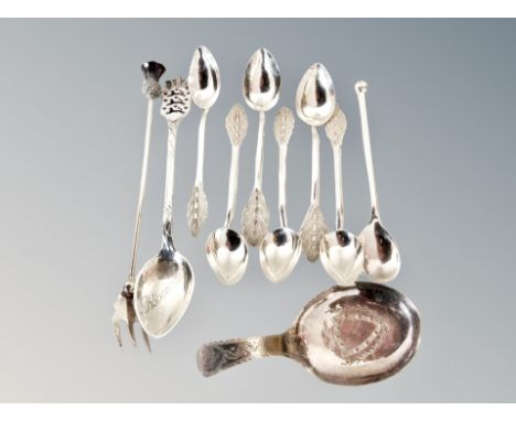 A collection of silver and white metal cutlery : caddy spoon, Scottish pickle fork etc 