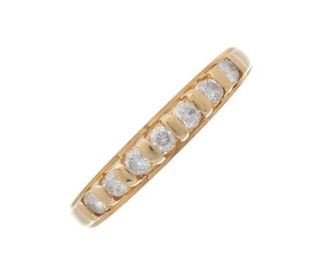 A 14ct gold brilliant-cut diamond seven-stone ring, estimated total diamond weight 0.30ct, hallmarks for Sheffield, ring size