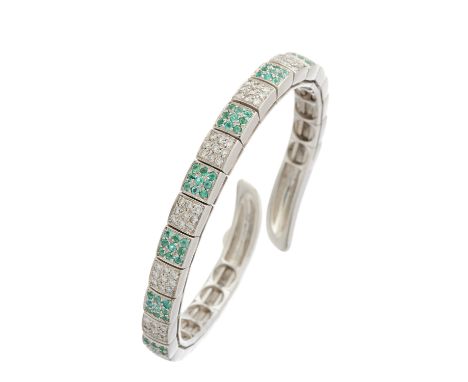 Gavello, an 18ct white gold brilliant-cut diamond and aquamarine flexible bangle, estimated total diamond weight 0.70ct, H-I 