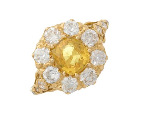 An 18ct gold yellow sapphire and old-cut diamond cluster ring, with old and single-cut diamond line shoulders, sapphire estim