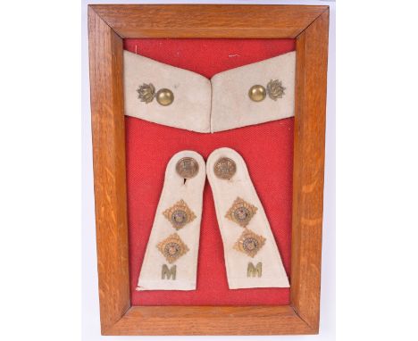 Victorian Lancashire Fusiliers Militia Insignia, consisting of a pair of white shoulder straps with brass rank pips and M to 