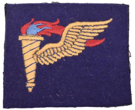 WW2 American Pathfinders Uniform Patch, British made example of the flaming winged torch to the centre of blue cloth rectangl