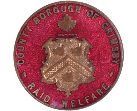 WW2 County Borough of Grimsby Raid Welfare Lapel Badge, gilt brass and enamel lapel badge with pin fitting to the reverse. En
