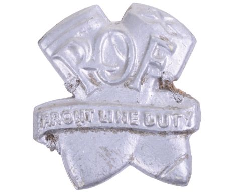 WW2 Royal Ordnance Factory Badge, pressed grey plastic example with crossed bombs having ROF to centre and scroll with “FRONT
