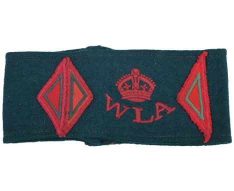 Women’s Land Army (W.L.A) Armband, embroidered example with one and half years service diamonds attached. Two buttons to the 