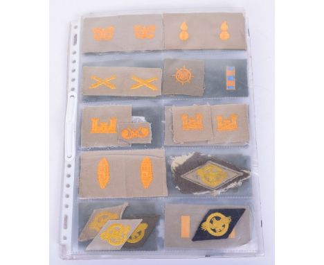 Selection of US Army and Air Force Insignia, consisting of embroidered Ruptured Duck insignias, embroidered shoulder rank, ra