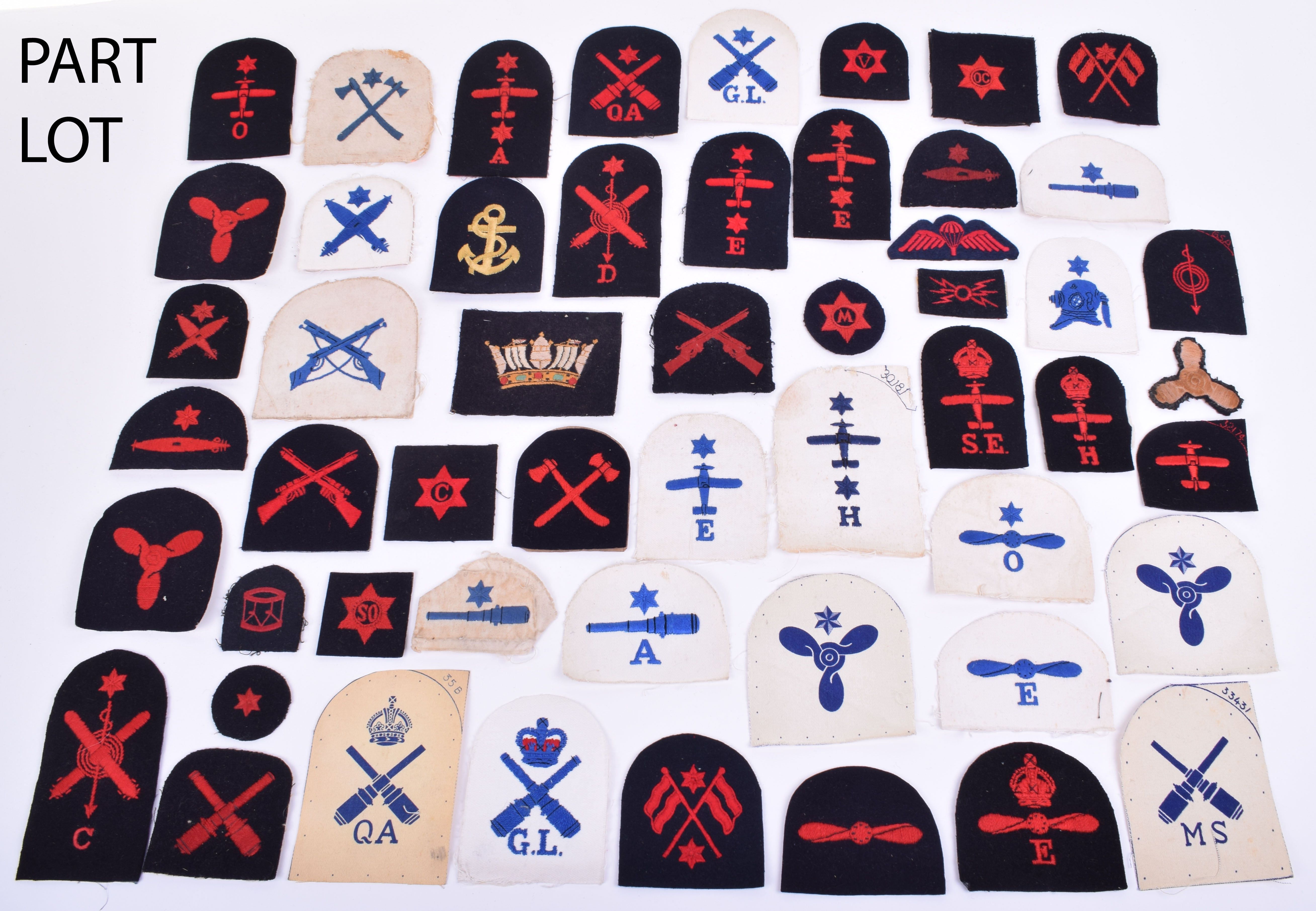 quantity-of-royal-navy-ratings-trade-badges-being-embroidered-and