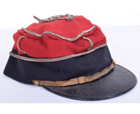 WW1 French Kepi, being early 1914 type example for a warrant officer rank level. Black central band with red cloth top decora