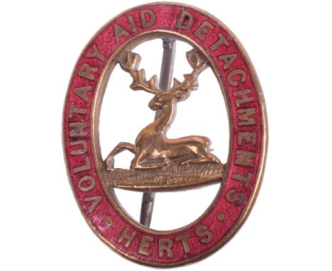 Great War Hertfordshire Voluntary Aid Detachment (V.A.D) Enamel Badge, gilt and enamel oval with stag to the centre. Within r