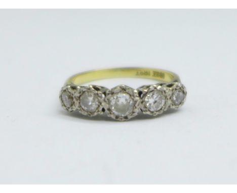 An 18ct gold and five stone diamond ring, 3.2g, N 