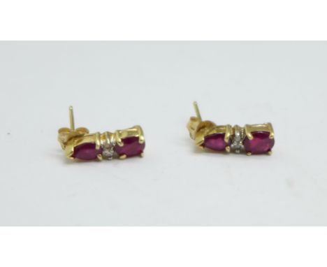 A pair of ruby and diamond earrings, marked 10K 