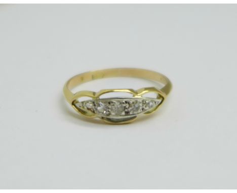 An 18ct gold and five stone diamond ring, 1.5g, M 