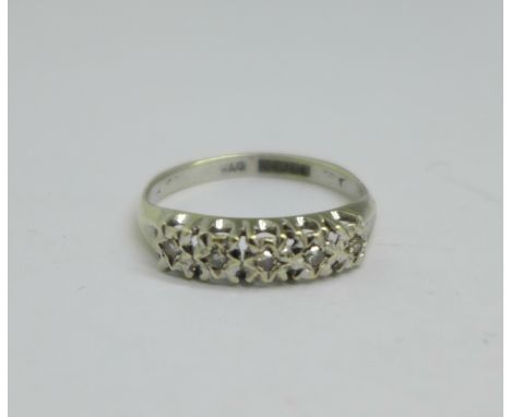 A 9ct white gold and five stone diamond ring, 2.5g, P 