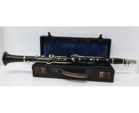 A Boosey &amp; Co. London clarinet, cased, number 15169 