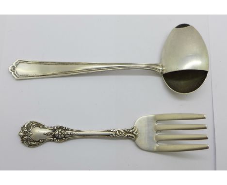 An American sterling silver fork, marked Towle, Old Master and an American sterling silver baby's feeder spoon marked Webster