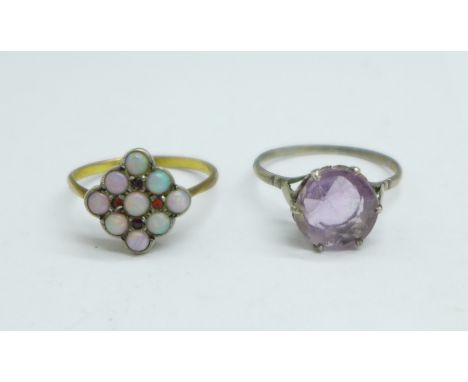 A 9ct gold and silver, opal and orange stone ring and a ring set with a lilac coloured stone, P and Q 