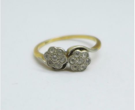 A yellow metal and white stone double daisy cluster ring, 2.6g, M 