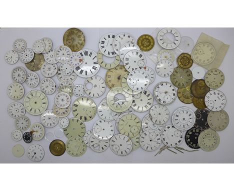 A collection of pocket watch and fob watch dials, mostly enamel 