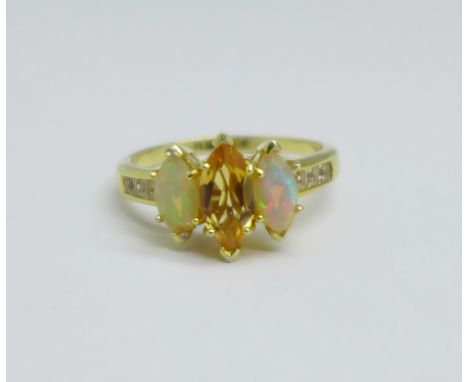 A silver gilt, welo opal and citrine ring, V 