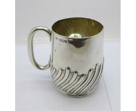 A Victorian silver mug, Sheffield 1891, Walker &amp; Hall, 147g, (rim slightly out of shape) 