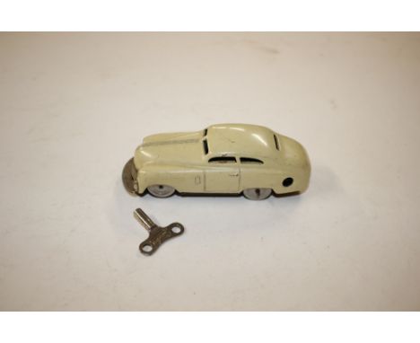 A Schuco Mirako tin plate car with key