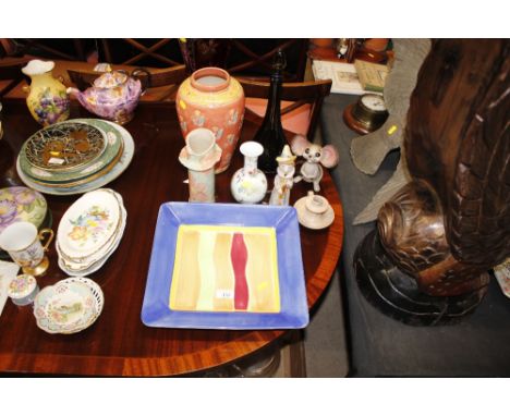 A tall ruby glass vase by Laura Ashley; various vases; a decanter and stopper; small china ornaments; a Chinese vase etc.
