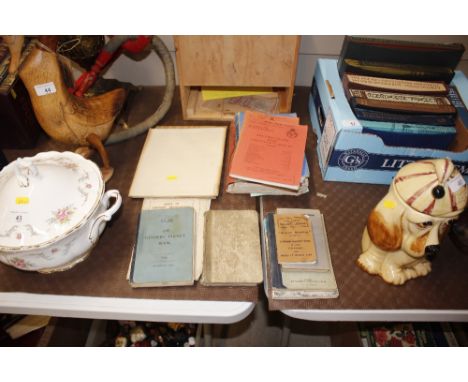 A collection of military related books and manuals to include The Gunnery Pocket Book 1932, a Guide to Aircraft Recognition; 
