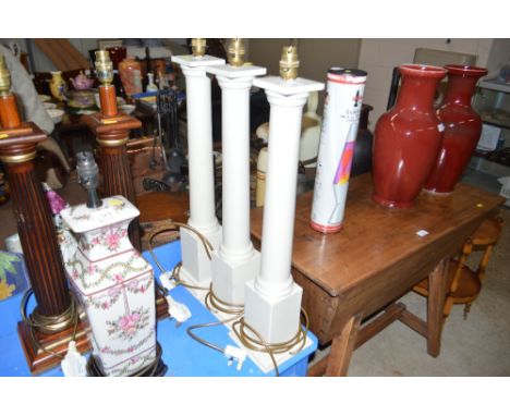 Three painted wooden table lamp bases with turned columns 