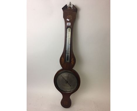 A 19th century mercury wheel barometer with inlaid shell and flower head motifs, silvered dial marked C. Tarelli below a Ther