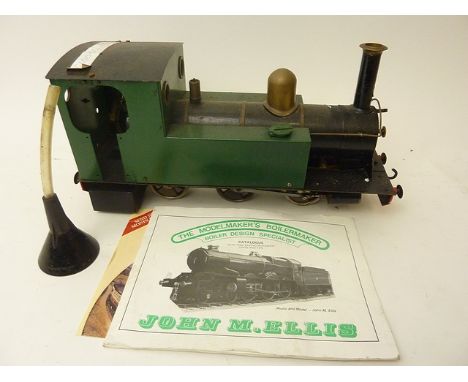 A tin plate and metal model of a railway engine with a John M Ellis The Model maker's Boilermaker catalogue